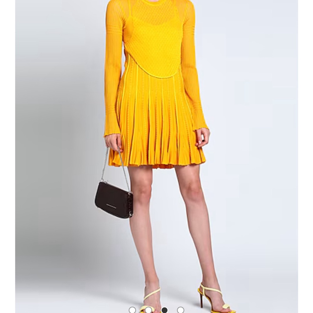 GIVENCHY
Cutout pleated knitted mini size Large